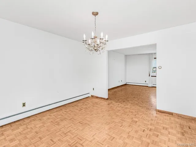 a view of a chandelier in an empty room