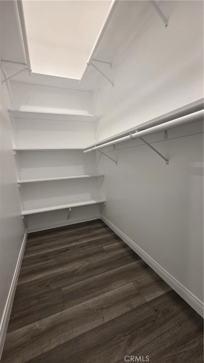 18222 Chatsworth Street Porter Ranch, CA 91326 - Photo 34 of 41 a view of a room with wooden floor