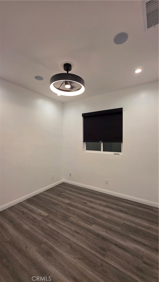 18222 Chatsworth Street Porter Ranch, CA 91326 - Photo 41 of 41 a view of wooden floor and chandelier in a room