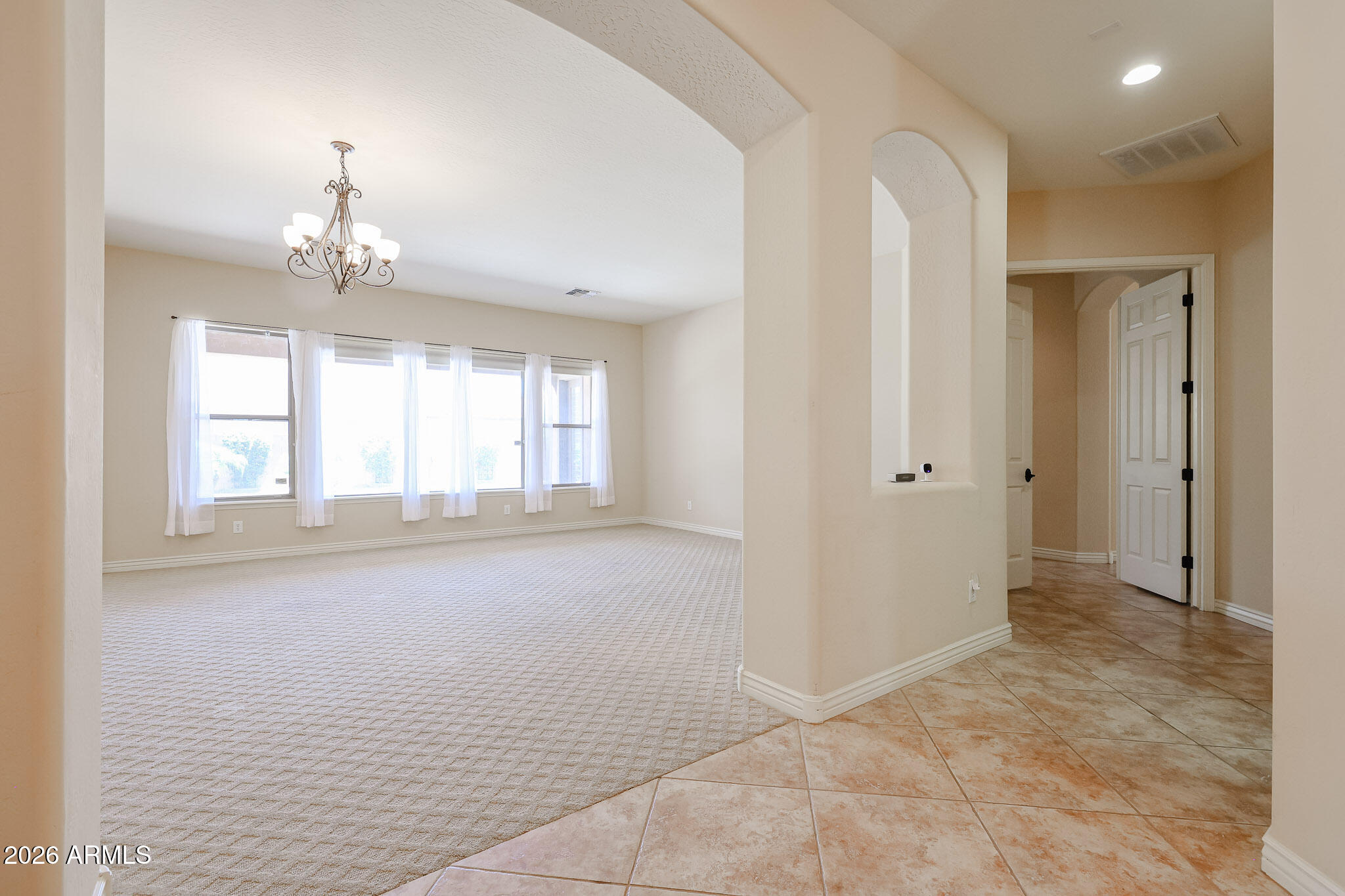 18175 West Narramore Road Goodyear, AZ 85338 - Photo 7 of 72 a view of livingroom with window