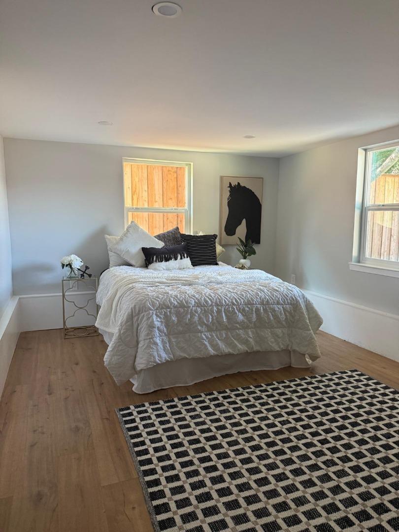 1170 Cotter Way Hayward, CA 94541 - Photo 13 of 18 a bedroom with a bed and a window