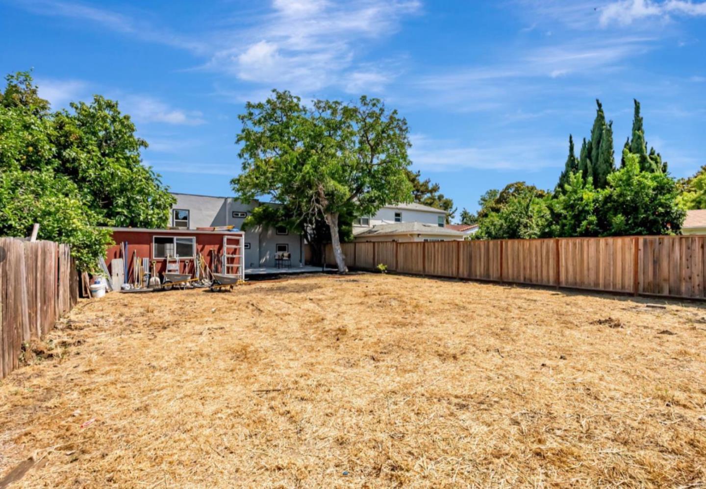 1170 Cotter Way Hayward, CA 94541 - Photo 16 of 18 a backyard of a house with lots of green space