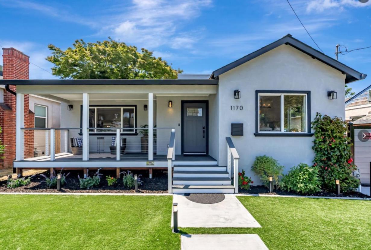 1170 Cotter Way Hayward, CA 94541 - Photo 2 of 18 a front view of a house with a yard table and chairs