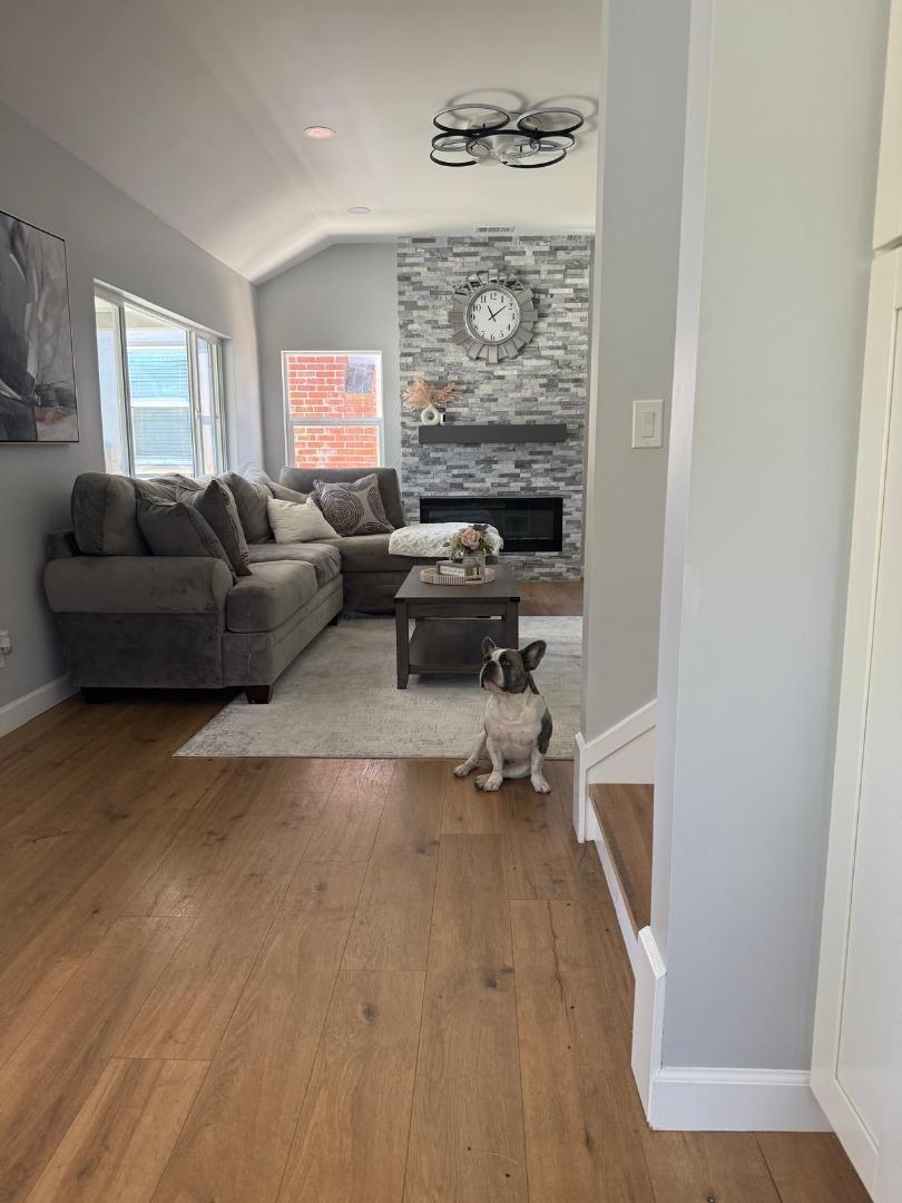 1170 Cotter Way Hayward, CA 94541 - Photo 8 of 18 a living room with furniture and a fireplace