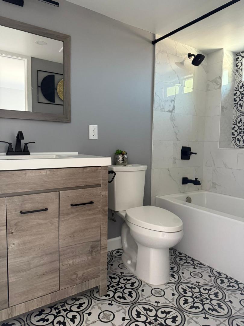 1170 Cotter Way Hayward, CA 94541 - Photo 10 of 18 a bathroom with a sink toilet vanity and shower