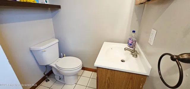 a bathroom with a toilet and a sink