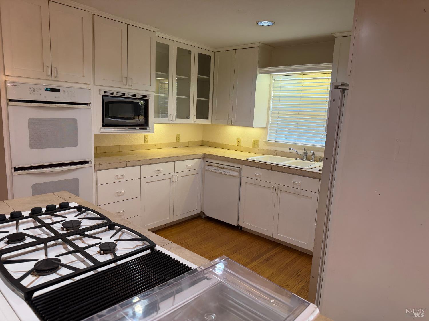1927 Marsh Road Santa Rosa, CA 95403 - Photo 10 of 31 a kitchen with sink a stove and cabinets