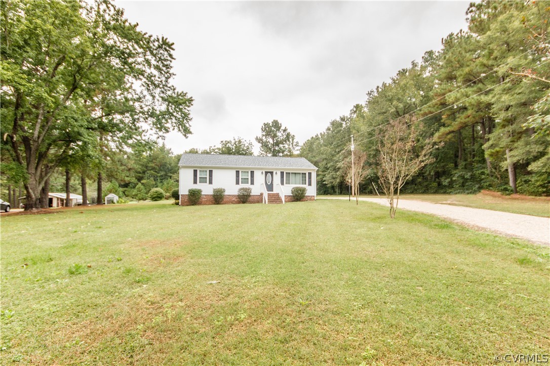 13404 Scotts Road Dewitt, VA 23840 - Photo 2 of 31 a view of a house with a yard