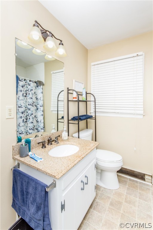 13404 Scotts Road Dewitt, VA 23840 - Photo 26 of 31 a bathroom with a sink and a toilet