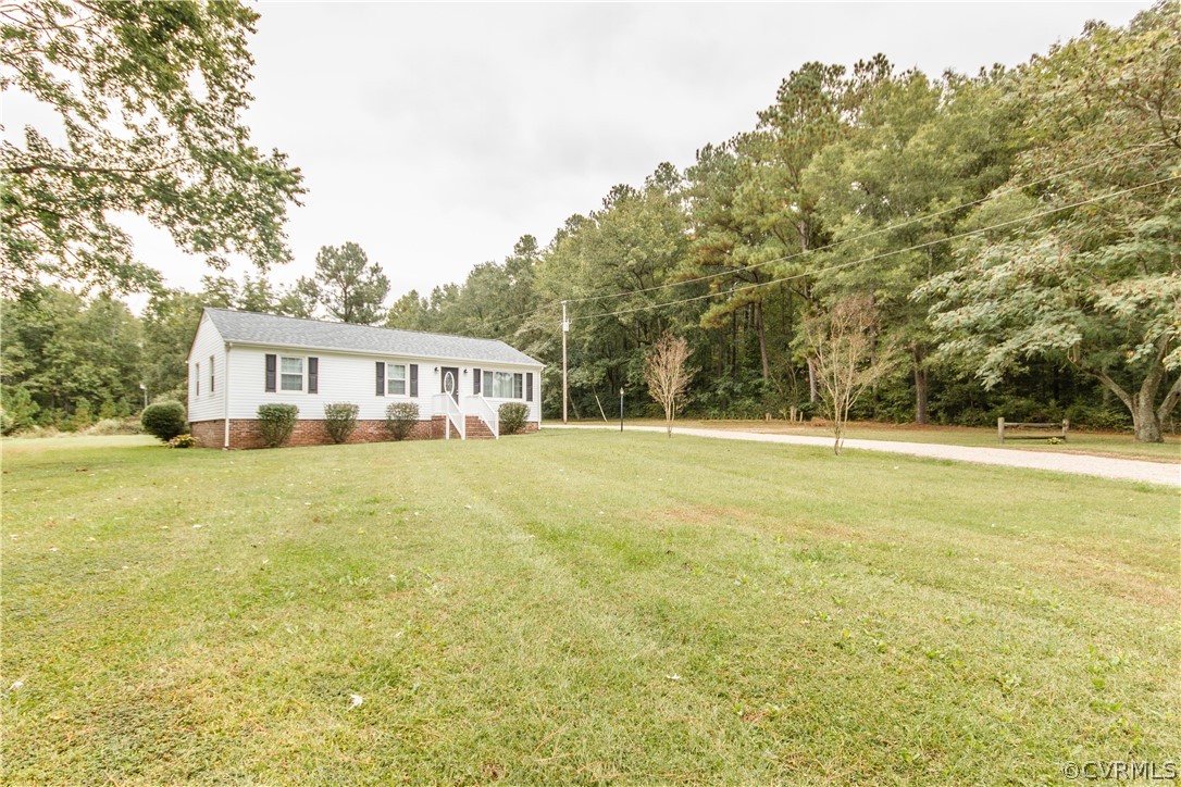 13404 Scotts Road Dewitt, VA 23840 - Photo 3 of 31 a view of house with outdoor space and swimming pool
