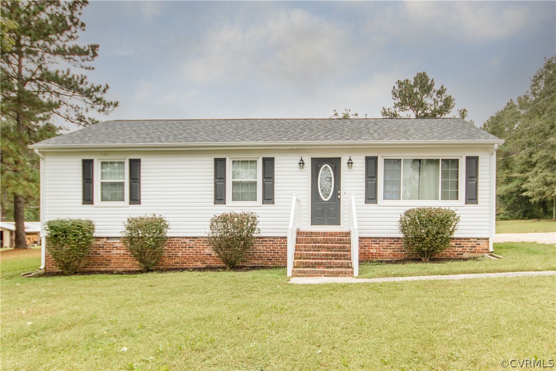 13404 Scotts Road Dewitt, VA 23840 - Photo 4 of 31 a house view with a garden space