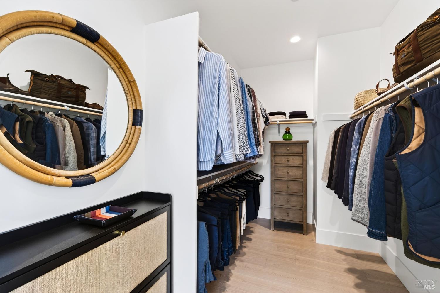 16 Upland Road St. Helena, CA 94574 - Photo 44 of 92 The Primary His Closet has plenty of room for clothes and storage.