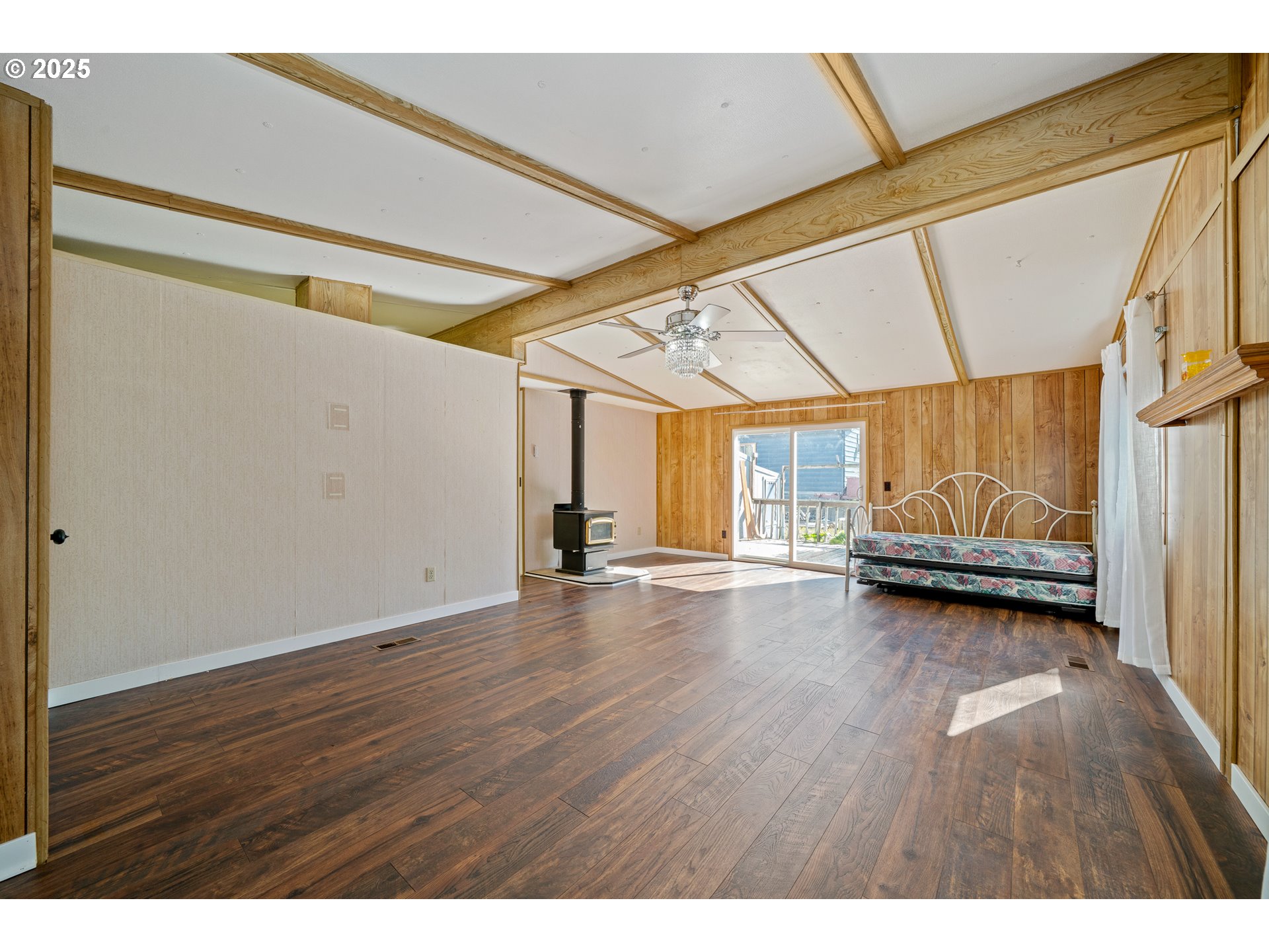 1057 Northeast 12th Avenue Rockaway Beach, OR 97136 - Photo 14 of 36 a view of room with wooden floor