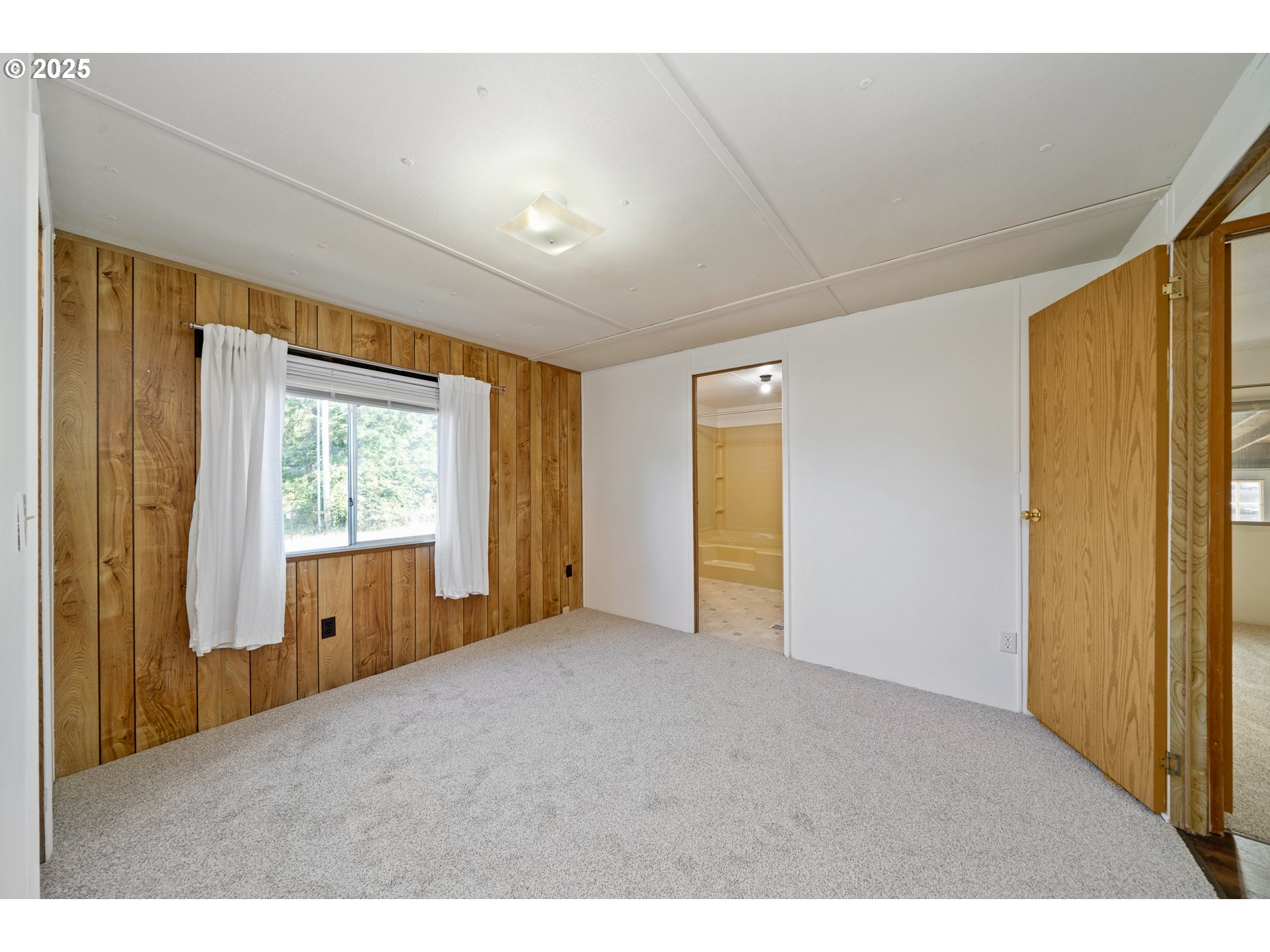 1057 Northeast 12th Avenue Rockaway Beach, OR 97136 - Photo 18 of 36 a view of empty room with window