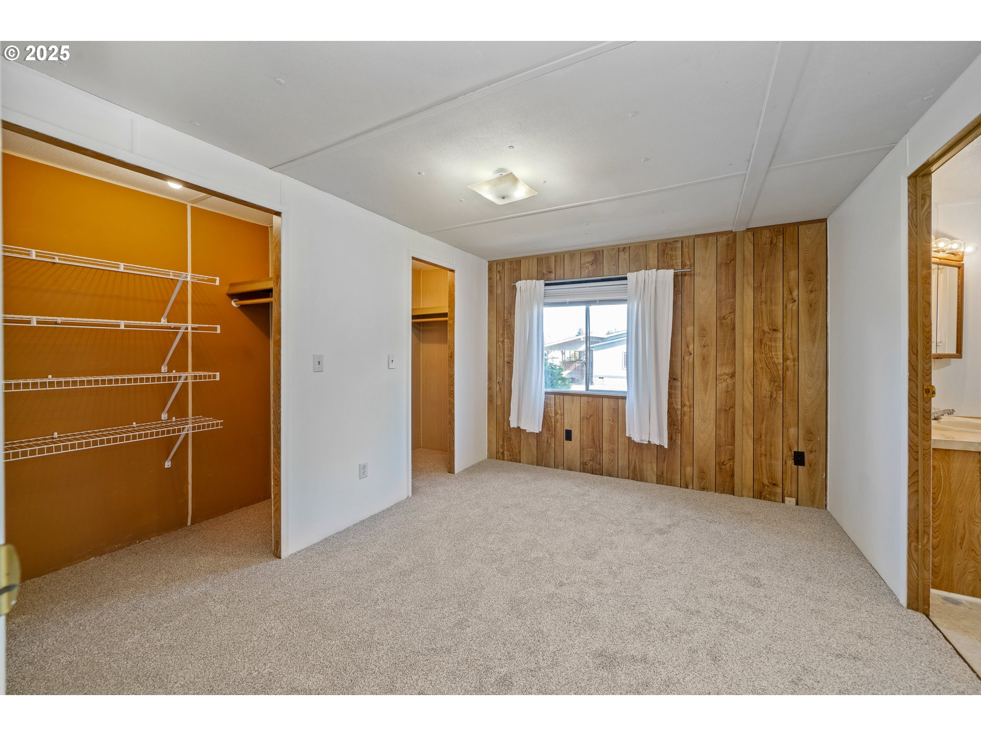 1057 Northeast 12th Avenue Rockaway Beach, OR 97136 - Photo 19 of 36 a view of empty room with windows
