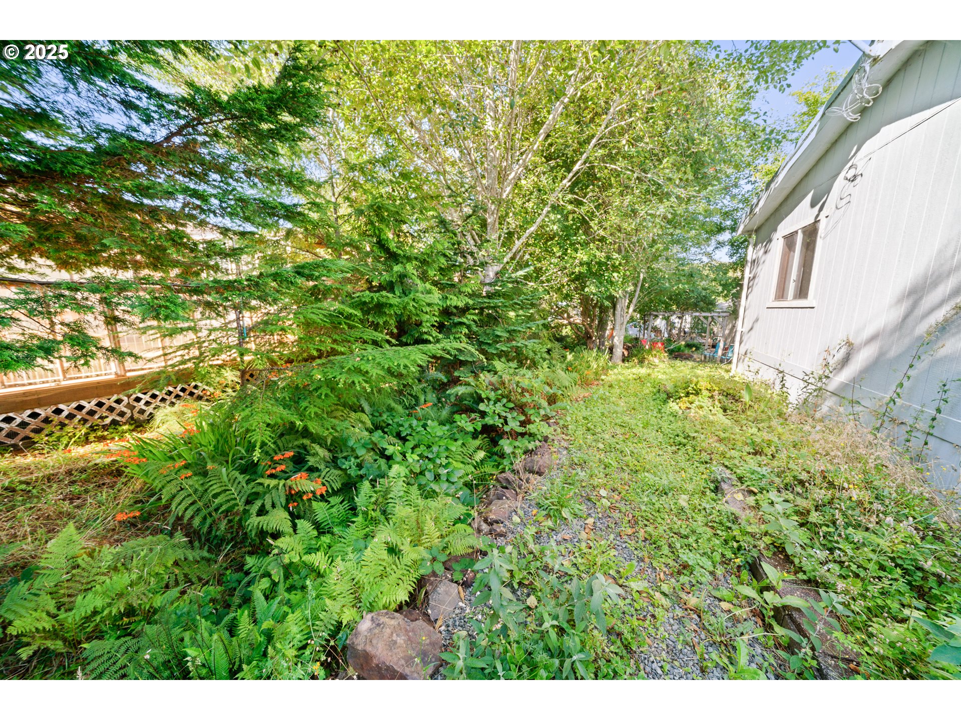 1057 Northeast 12th Avenue Rockaway Beach, OR 97136 - Photo 27 of 36 a view of a garden