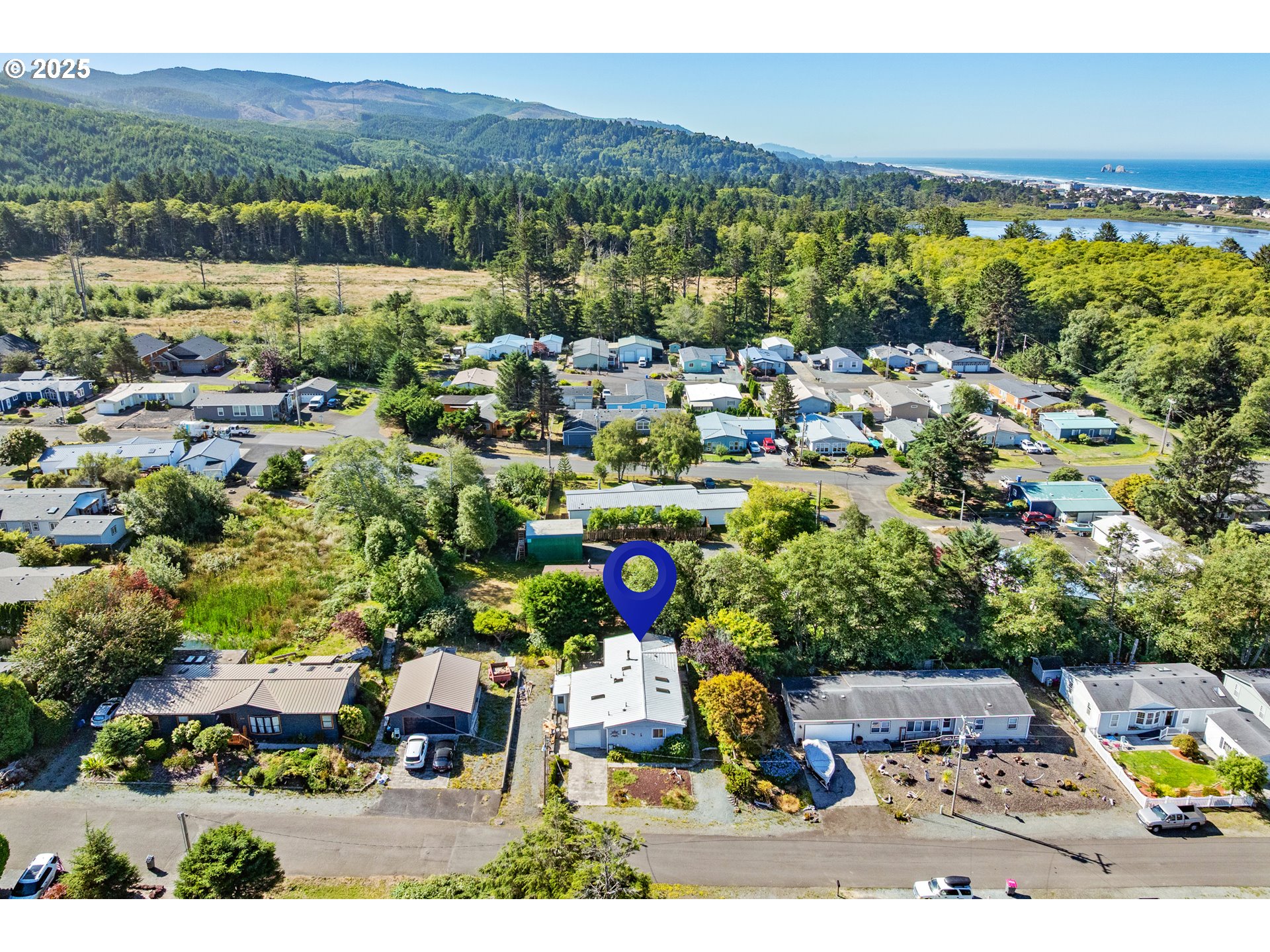1057 Northeast 12th Avenue Rockaway Beach, OR 97136 - Photo 31 of 36 an aerial view of multiple house