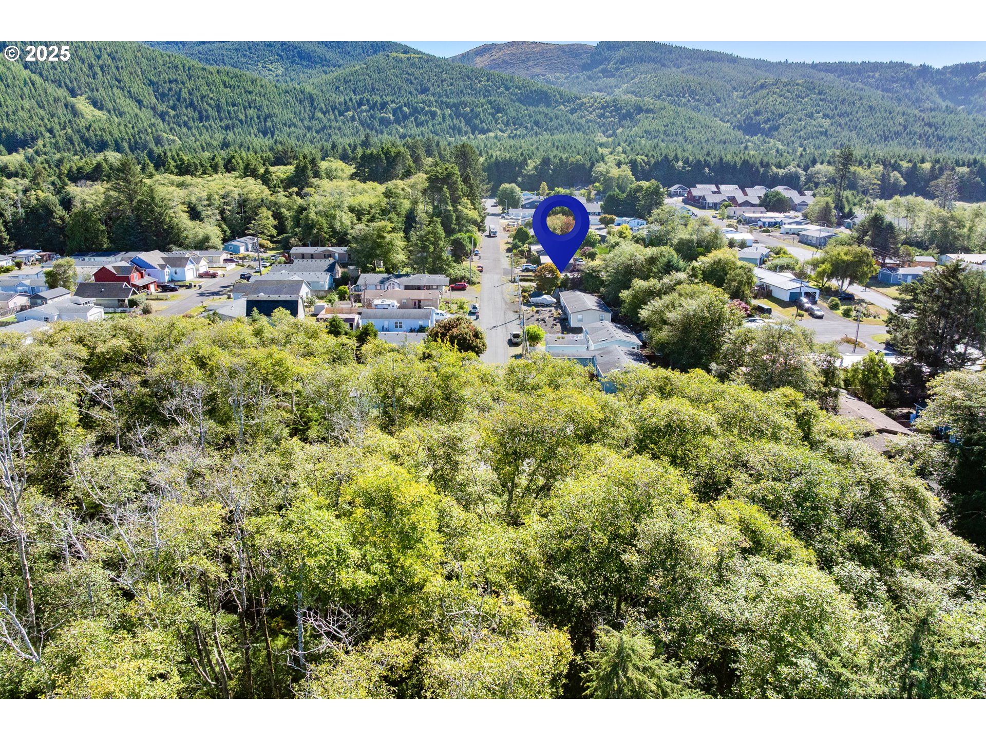 1057 Northeast 12th Avenue Rockaway Beach, OR 97136 - Photo 35 of 36 a view of a and mountain view