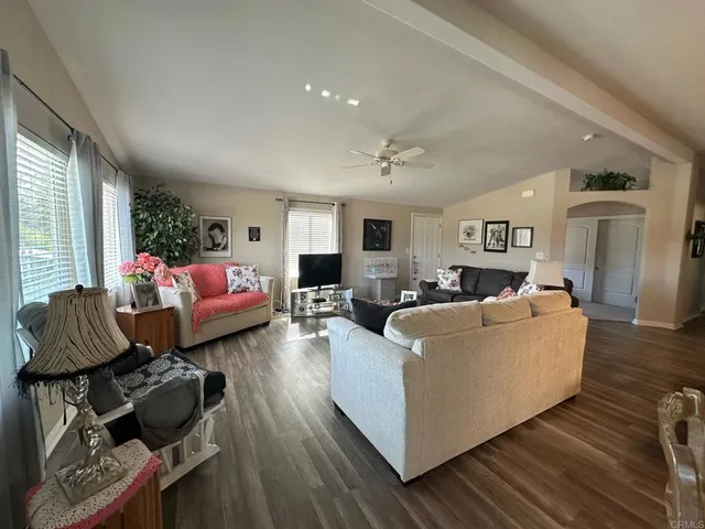 a living room with furniture and a couch