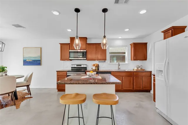 a living room with furniture and a table