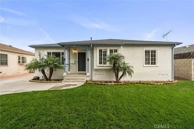 a house view with a garden space