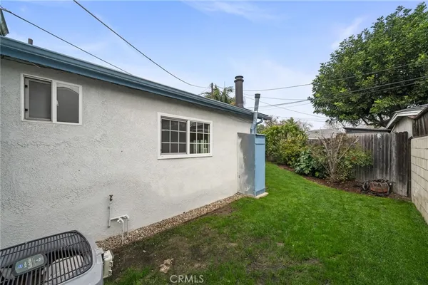 a house view with a backyard space