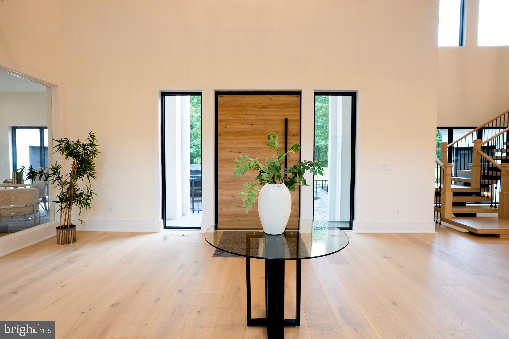 5947 Doyle Road Clifton, VA 20124 - Photo 10 of 69 a view of livingroom with furniture and floor to ceiling window