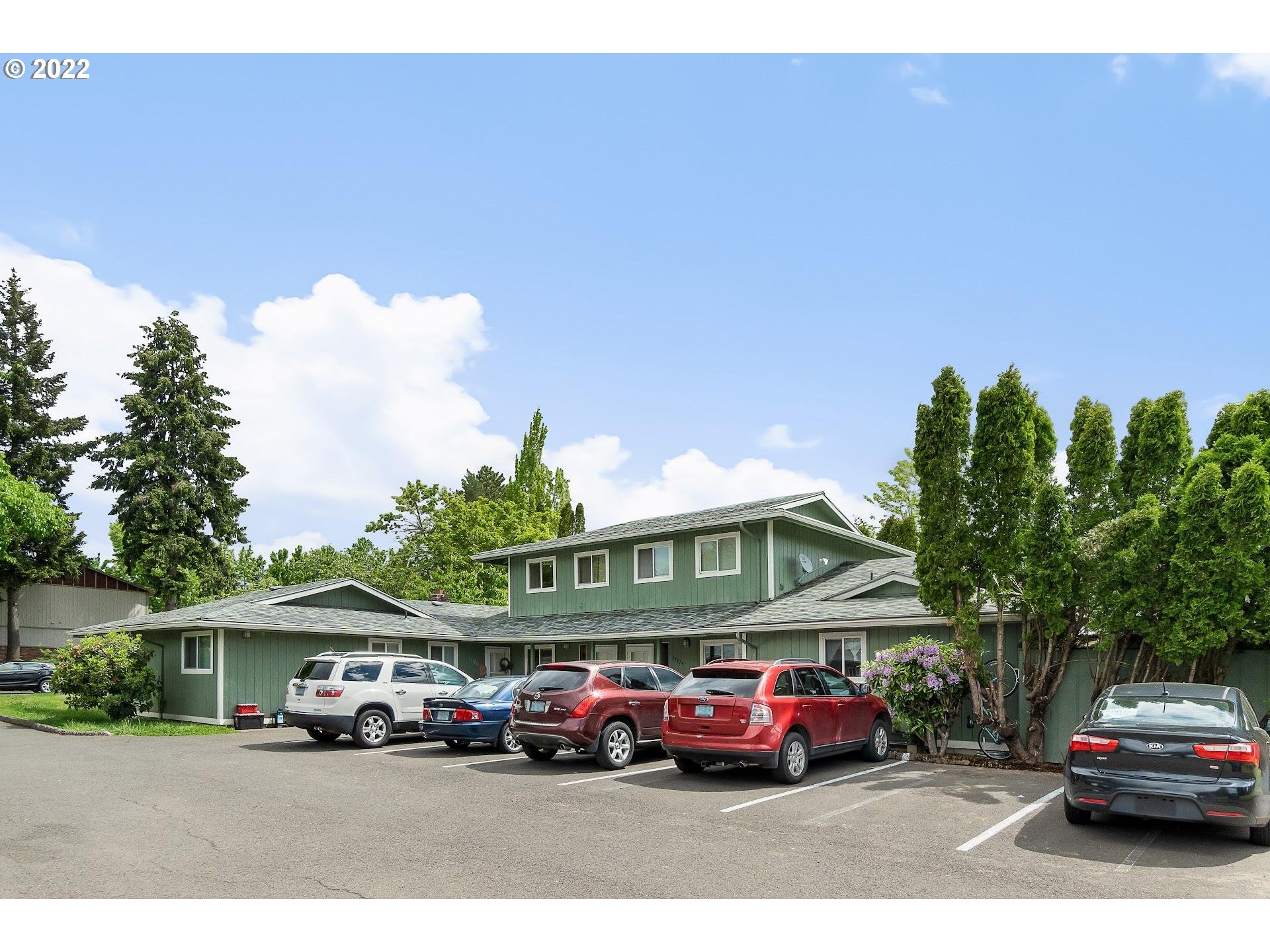 17170 Southwest Merlo Road Beaverton, OR 97003 - Photo 10 of 16 a front view of a building with garden