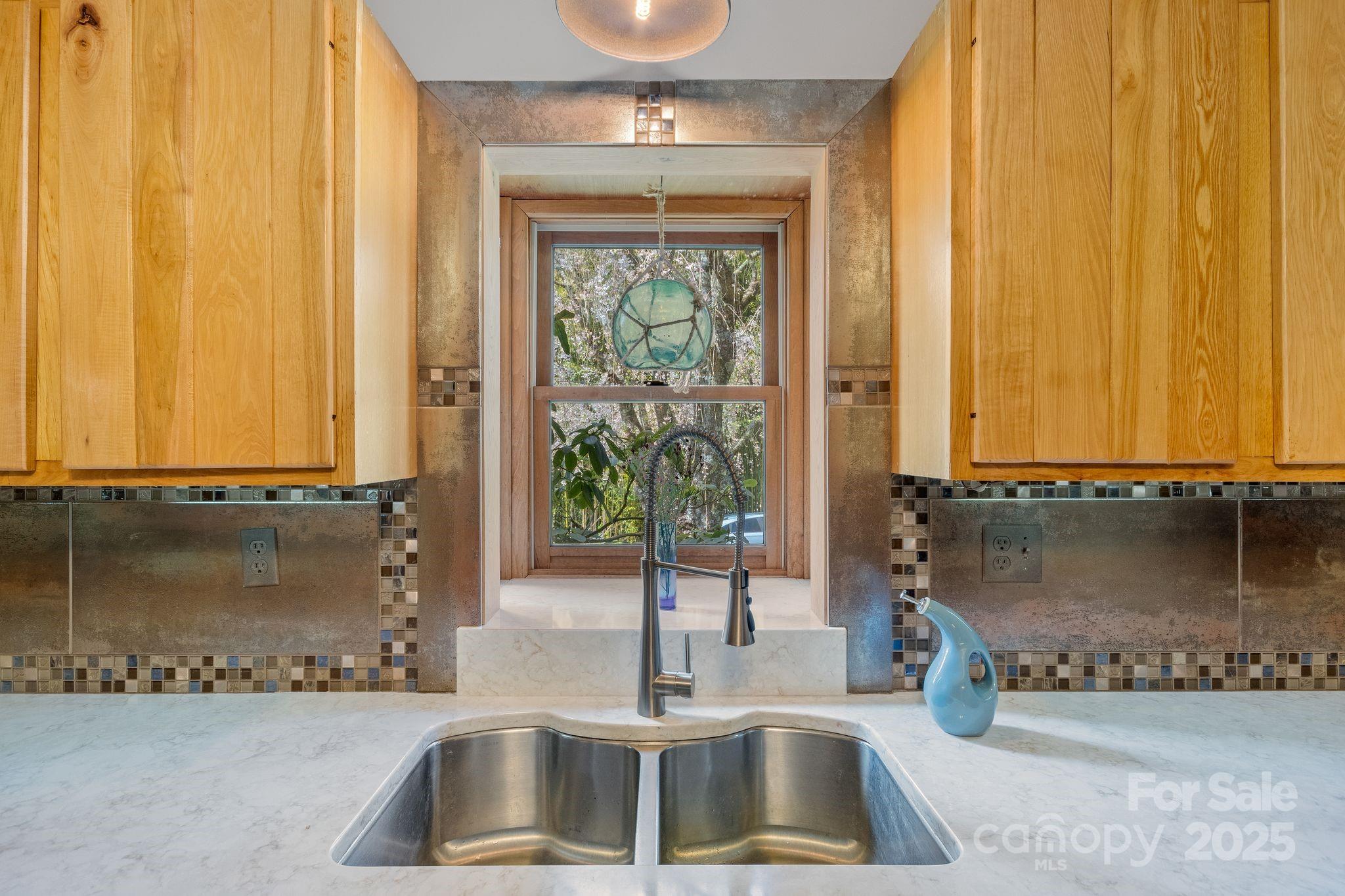 22 Morgan Branch Road Weaverville, NC 28787 - Photo 17 of 47 a kitchen with a sink and a window