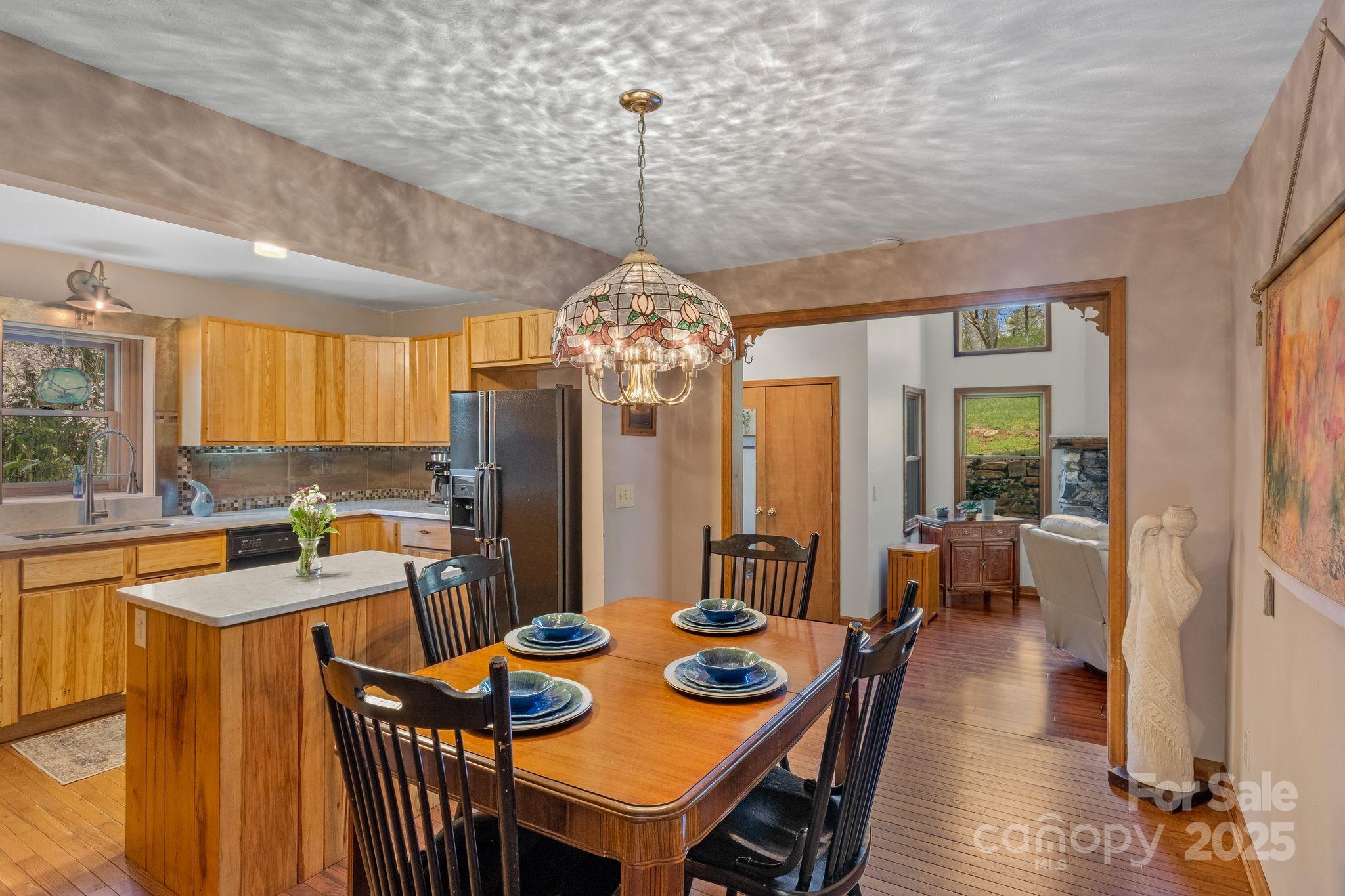 22 Morgan Branch Road Weaverville, NC 28787 - Photo 19 of 47 a view of a dining room with furniture window and outside view