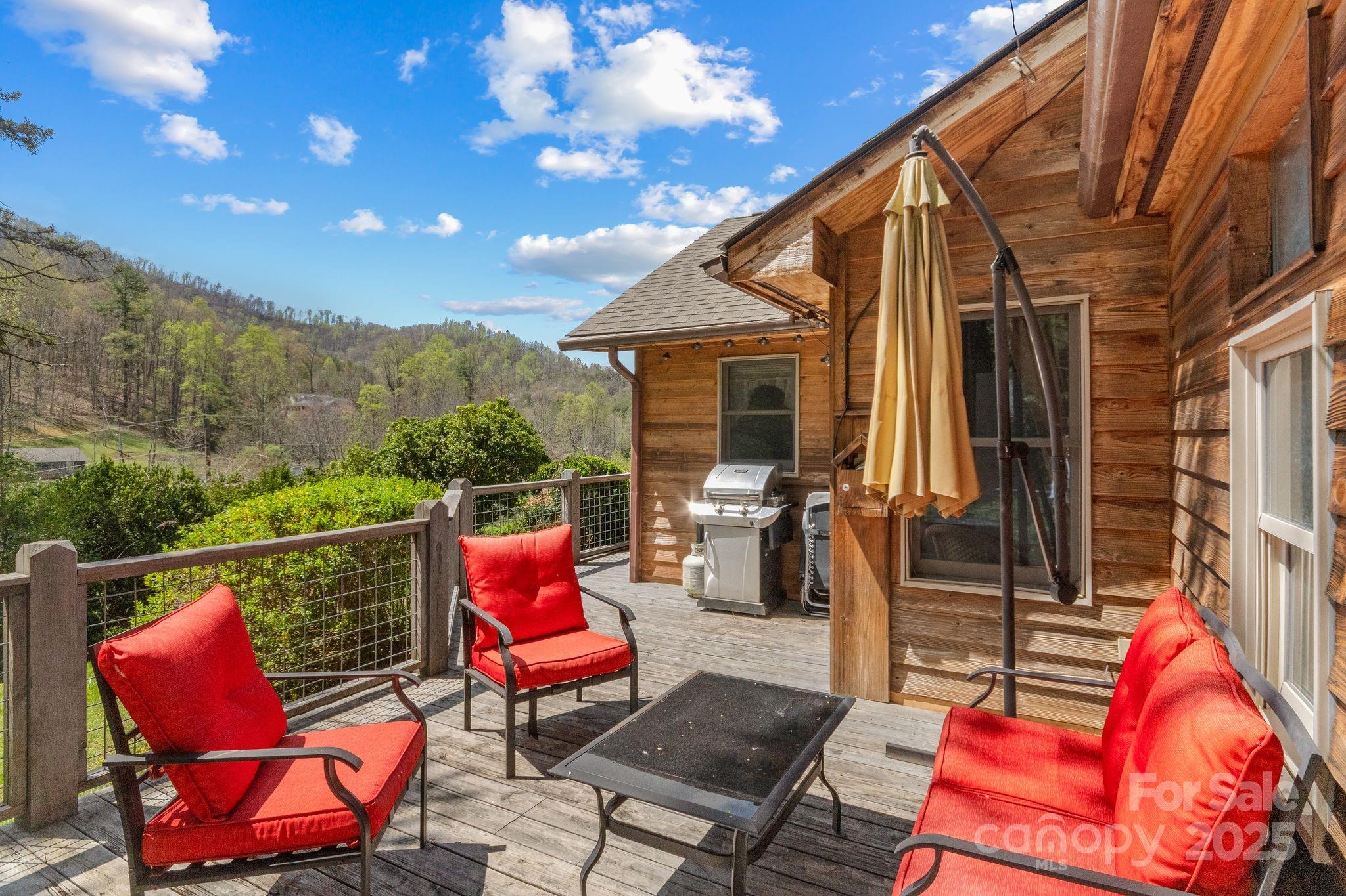 22 Morgan Branch Road Weaverville, NC 28787 - Photo 32 of 47 a outdoor space with lots of furniture and a couch