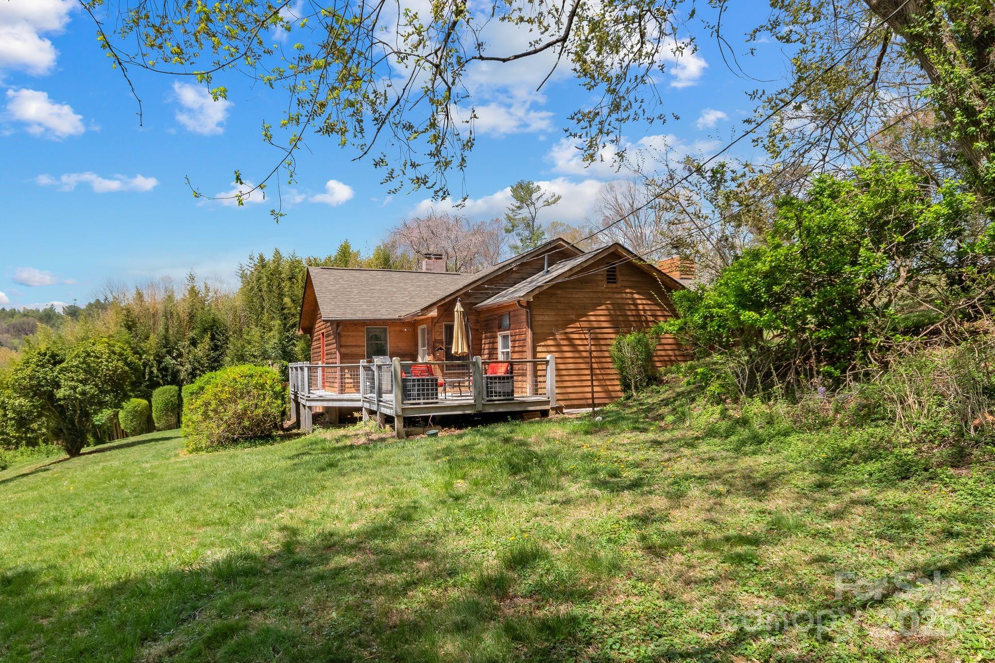 22 Morgan Branch Road Weaverville, NC 28787 - Photo 37 of 47 a house view with a garden space