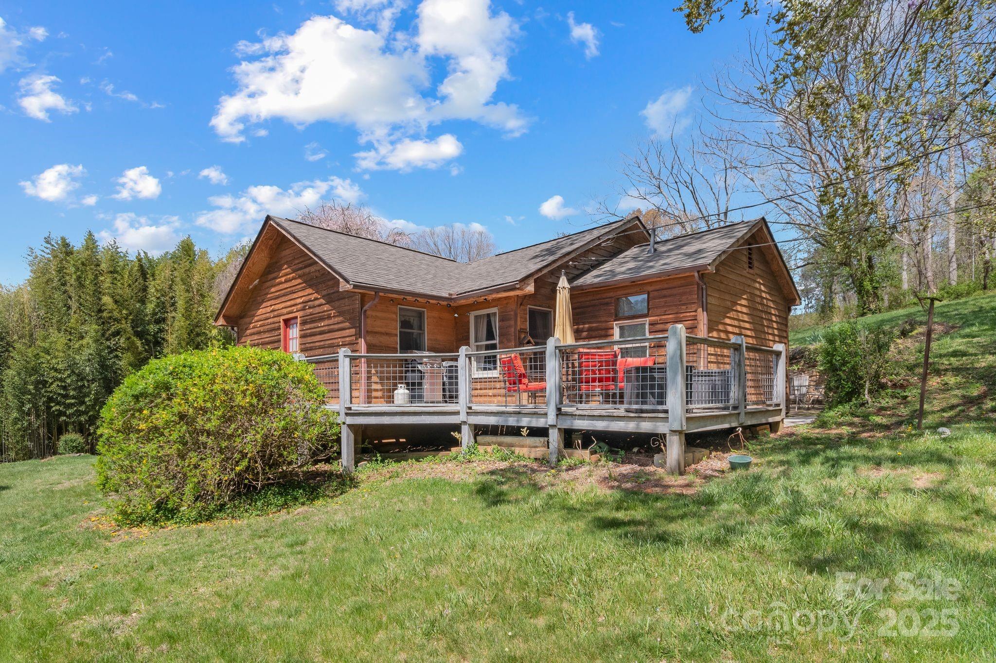 22 Morgan Branch Road Weaverville, NC 28787 - Photo 38 of 47 a house view with a garden space