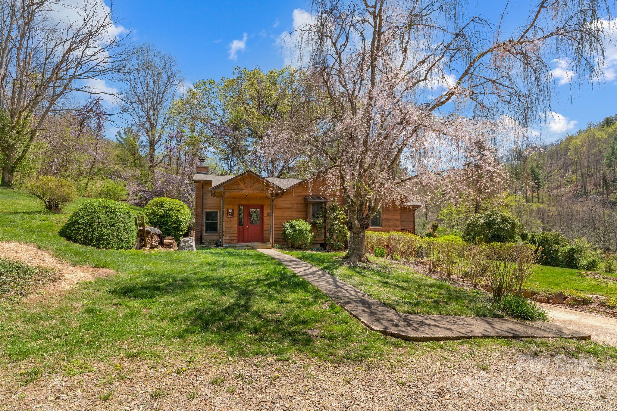 22 Morgan Branch Road Weaverville, NC 28787 - Photo 4 of 47 a view of a house with a yard
