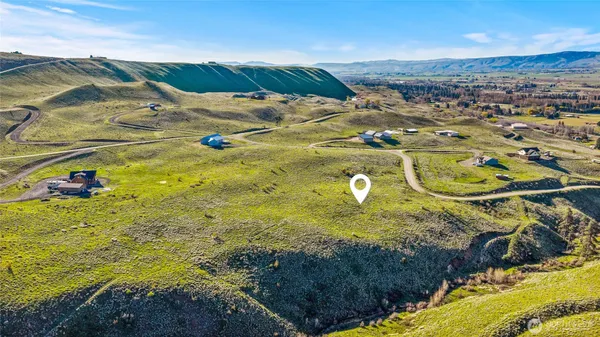 a view of a lake with a mountain in the background