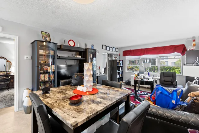 a view of a dining room with furniture