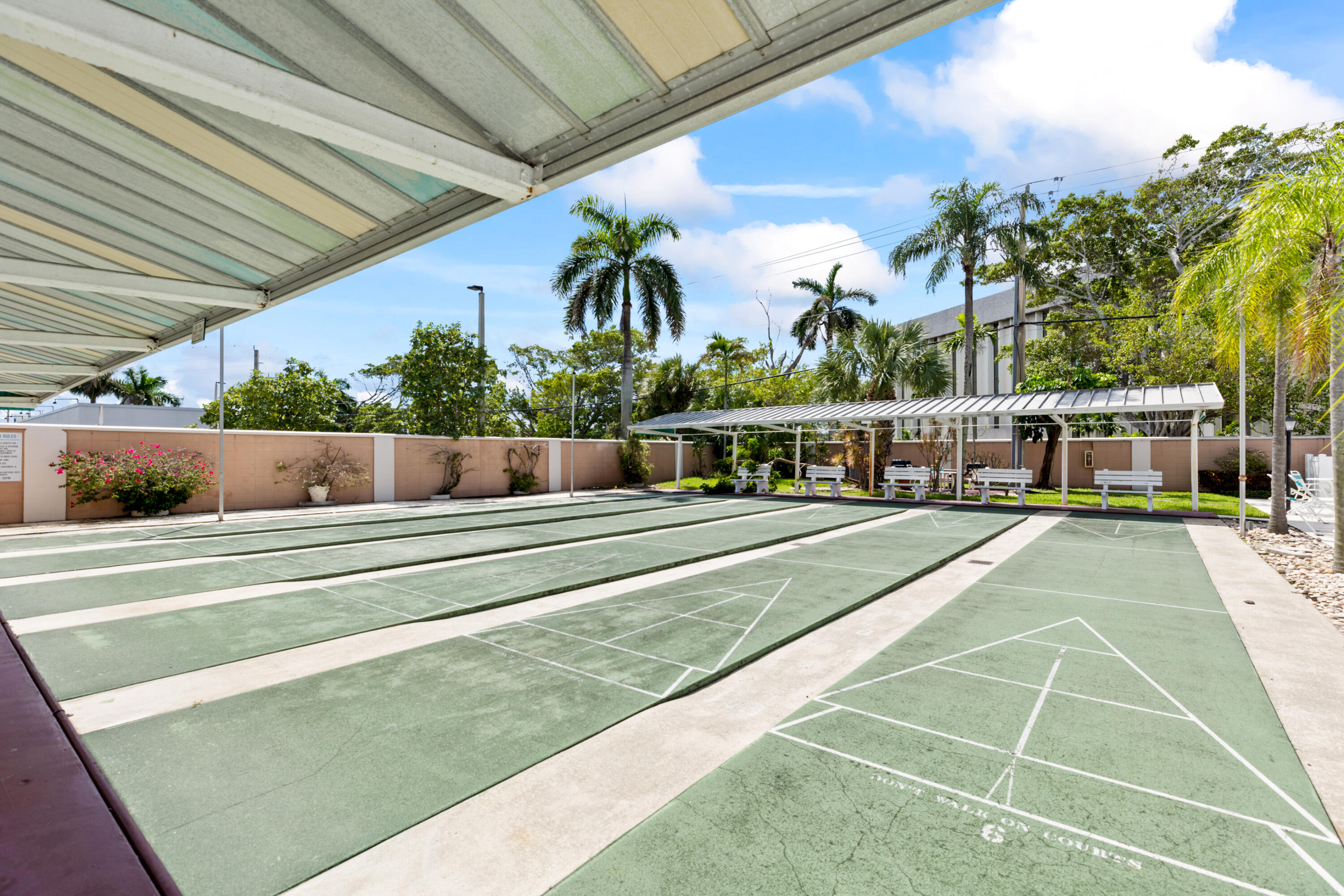 400 Northeast 20th Street, Unit B108 Boca Raton, FL 33431 - Photo 22 of 31 a view of a swimming pool with a patio