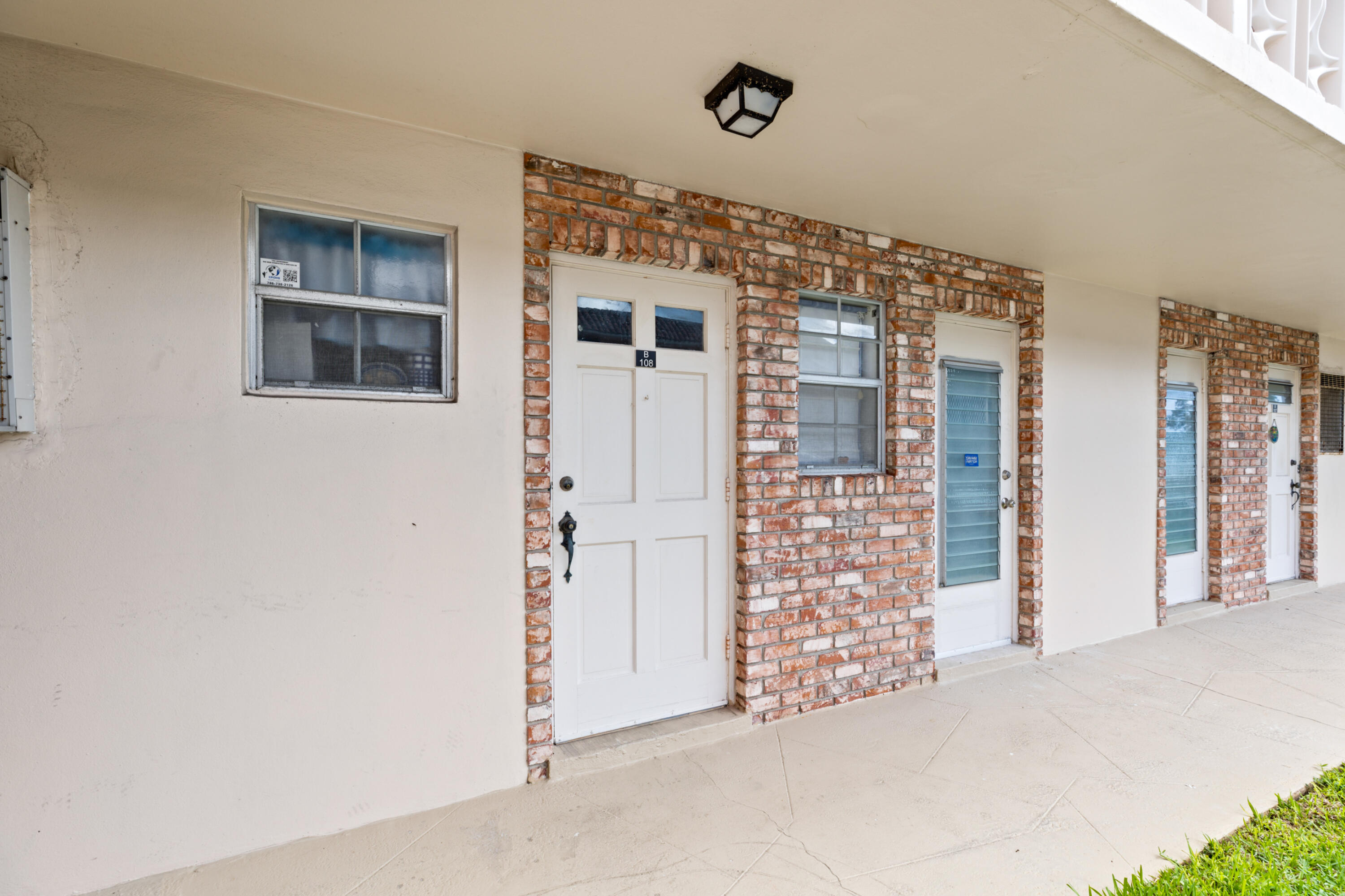 400 Northeast 20th Street, Unit B108 Boca Raton, FL 33431 - Photo 5 of 31 a view of livingroom with entryway