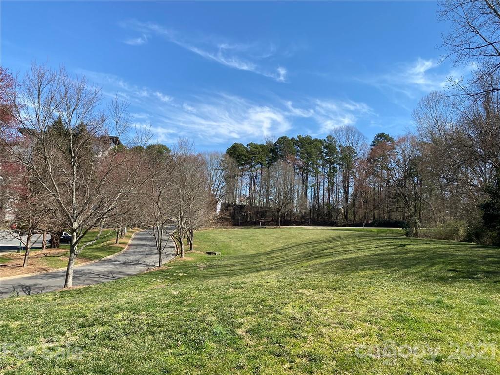 19839 Henderson Road, Unit A Cornelius, NC 28031 - Photo 21 of 23 a big yard with lots of green space