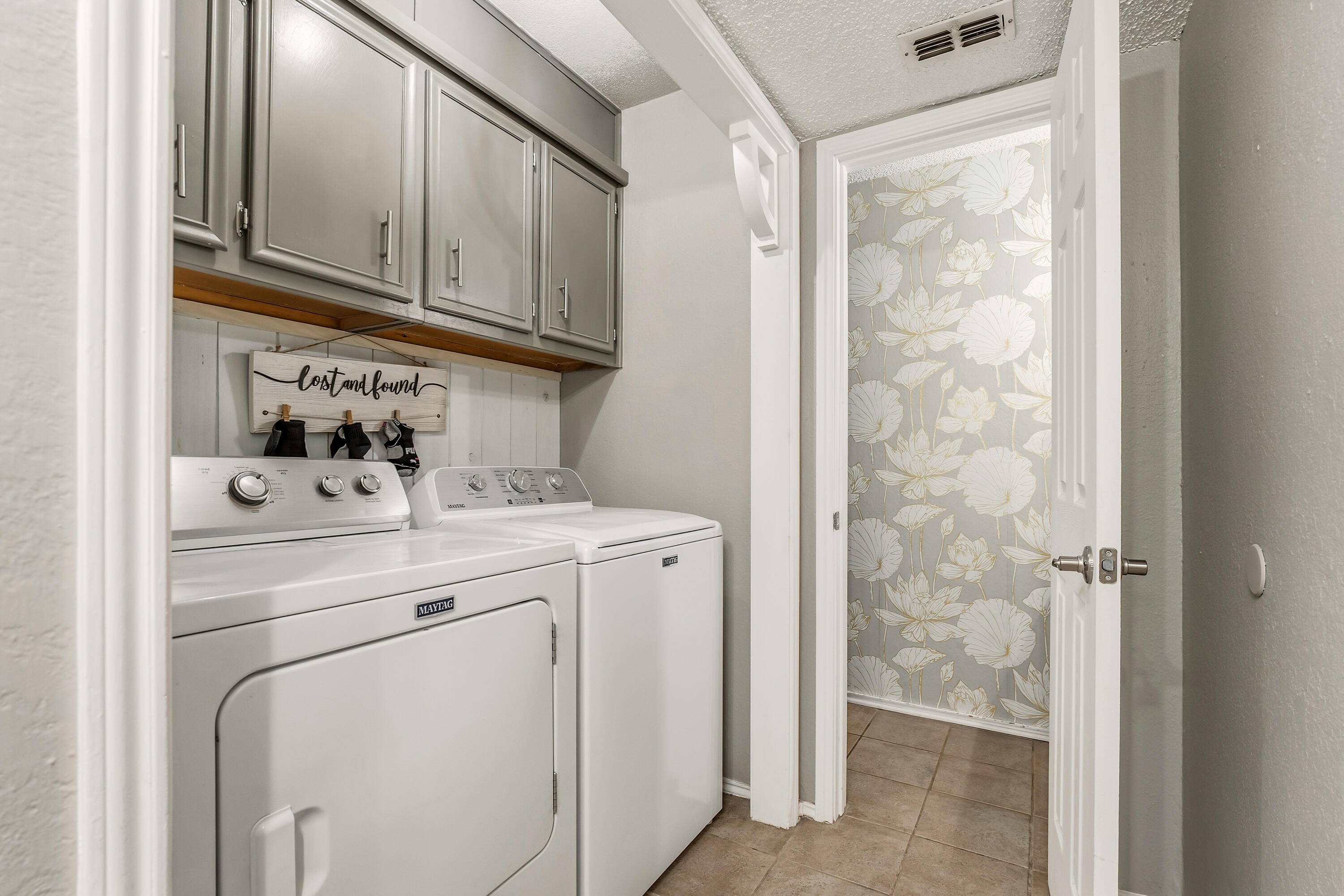 6110 36th Street, Unit 2 Lubbock, TX 79407 - Photo 19 of 22 Laundry Area with Extra Storage