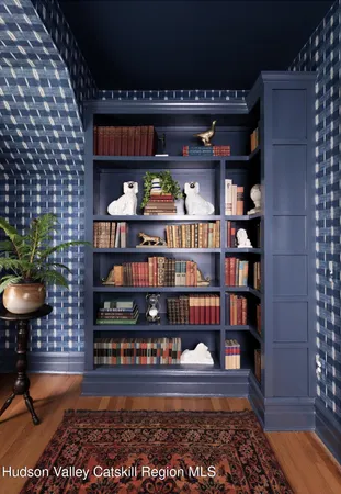 a kitchen with a table and chairs in it