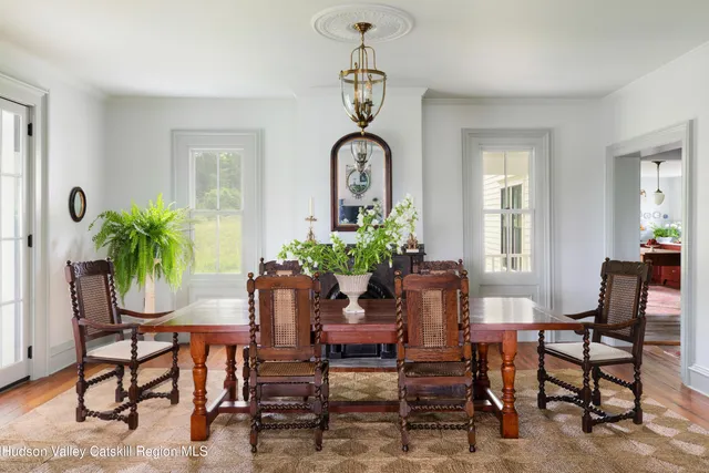 a bathroom with a mirror and a sink