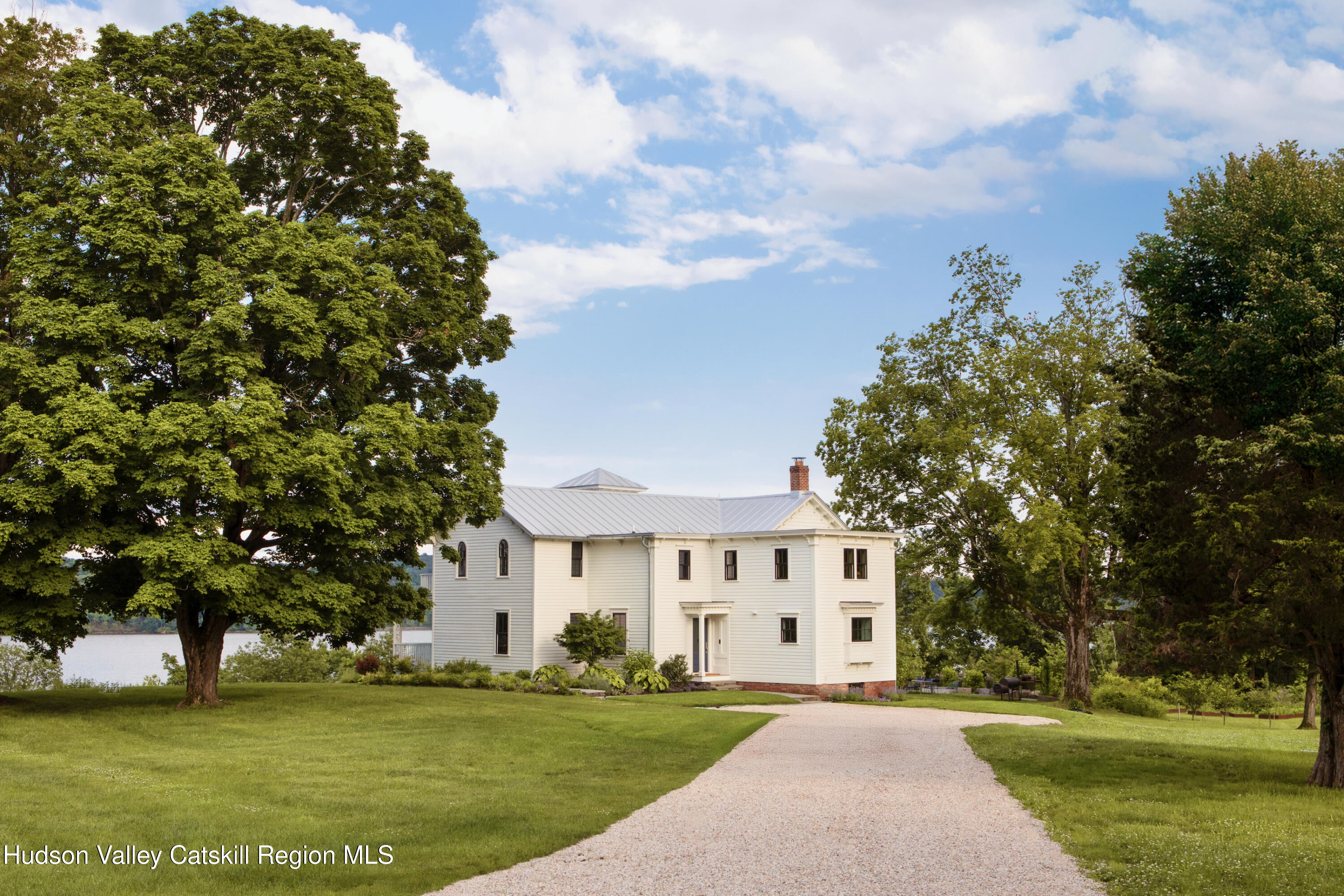 290 Ulster Landing Road Kingston, NY 12401 - Photo 2 of 89 a front view of a house with a garden