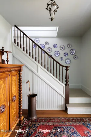 a bedroom with a bed and a table