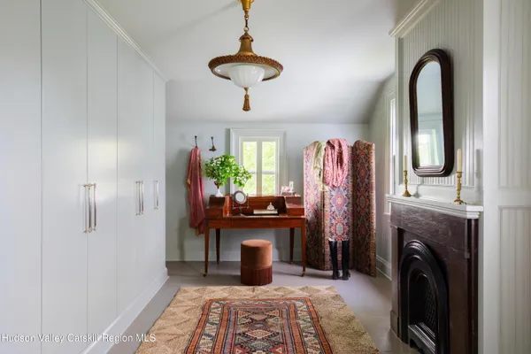 a view of a house with a yard and plants