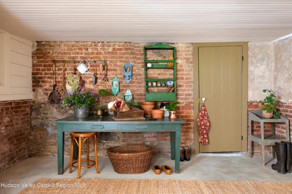 a view of beach with swimming pool and green space
