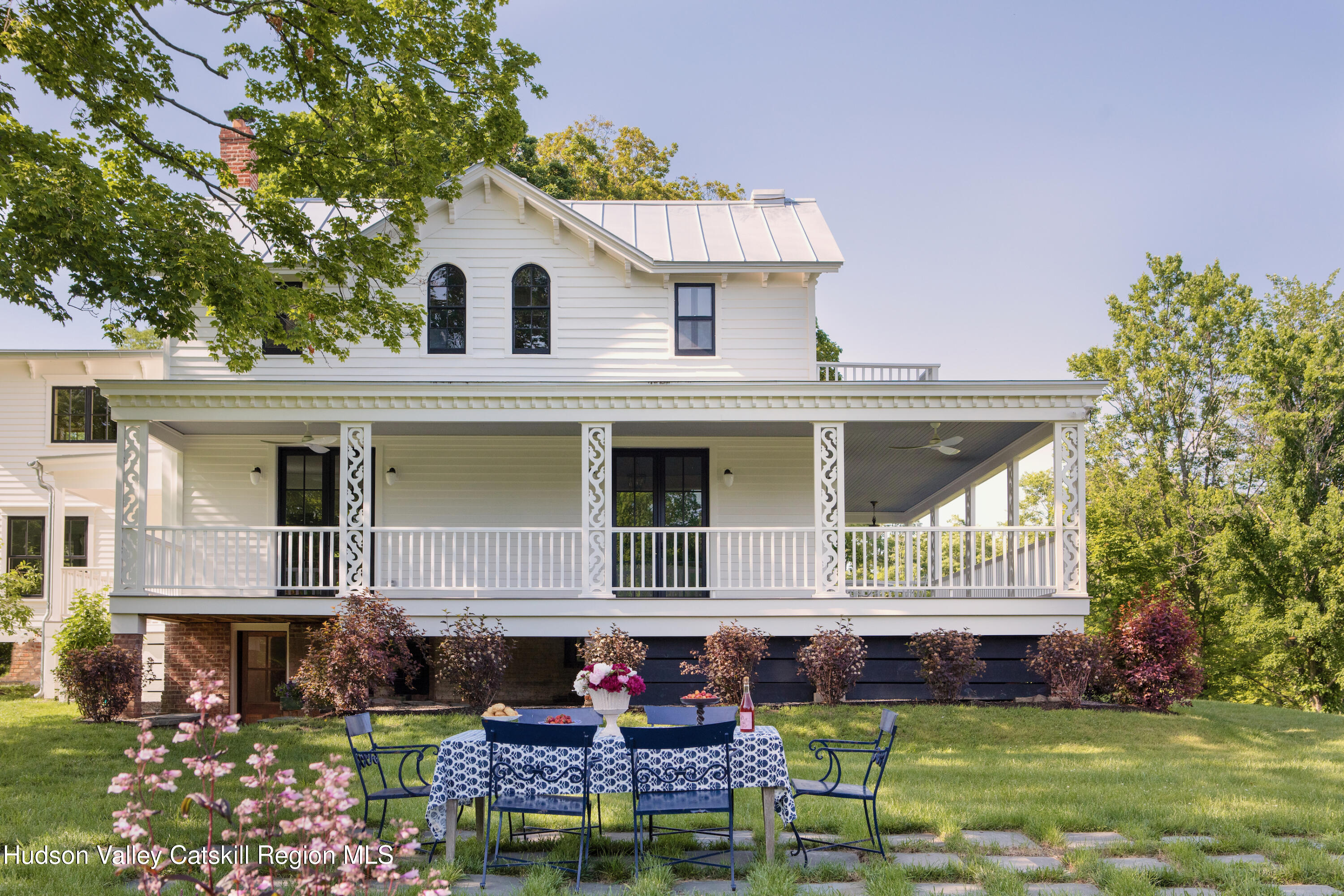 290 Ulster Landing Road Kingston, NY 12401 - Photo 7 of 89 a front view of a house with a garden and plants