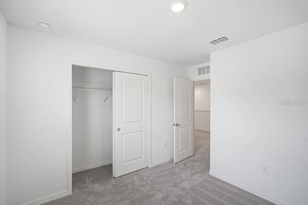 13245 Tropical Breeze Way Hudson, FL 34669 - Photo 15 of 41 a view of an empty room