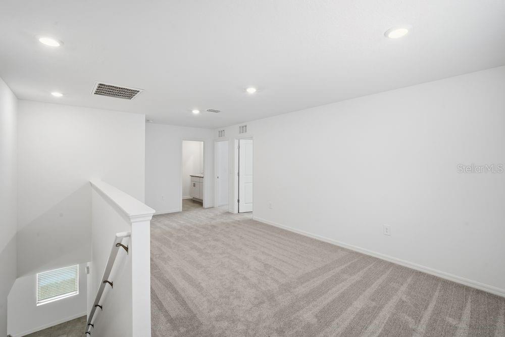 13245 Tropical Breeze Way Hudson, FL 34669 - Photo 22 of 41 a view of an empty room