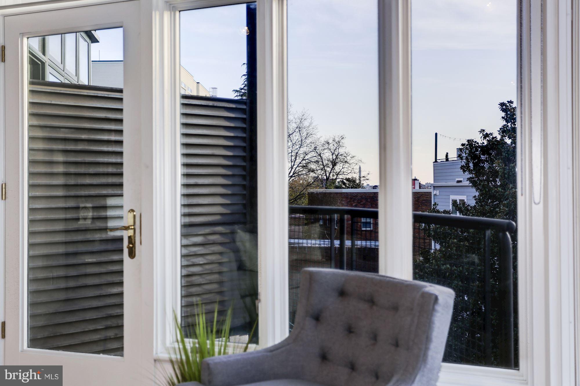 1700 Kalorama Road Northwest, Unit 312 Washington, DC 20009 - Photo 11 of 45 a balcony view with a potted plant